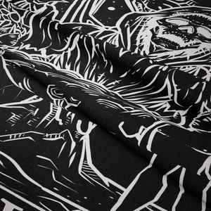 Detailed close-up showing high-contrast gothic skull print on soft textile fabric texture