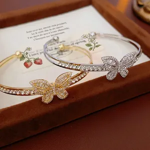 Luxury gold plated butterfly open bracelet with sparkling cubic zirconia inlay