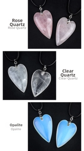 Detailed close-up of heart-shaped Rose Quartz, Clear Quartz and Opalite crystal pendants