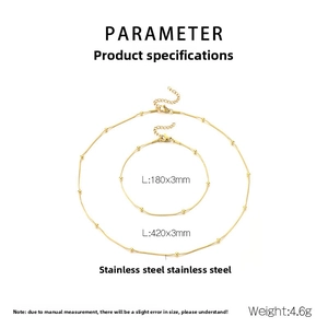 Détail de l'ensemble collier et bracelet en perles dorées avec dimensions et matériau inox