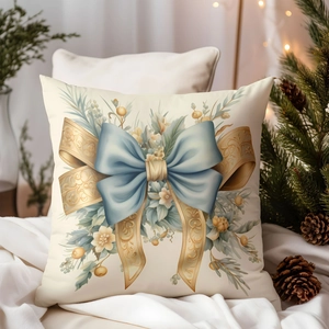 Detail of luxury white pillow case with blue bow and golden ribbon holiday embroidery