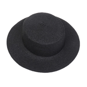 Macro view of tight black woven texture on a flat top wide brim summer sun hat