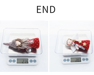 Christmas ornaments weight test showing Santa and Angel doll on a digital scale