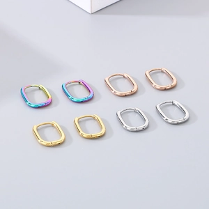 U-shaped stainless steel earrings in rainbow, rose gold, gold, and silver finishes