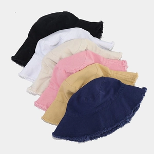 Frayed edge bucket hats for men and women in various washed cotton colors for summer
