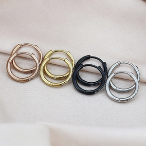 Polished stainless steel hoop earrings with tiny crystals in rose gold, gold, silver, and black