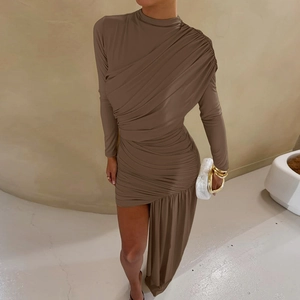 Detail of coffee brown ruched dress with long sleeves and elegant asymmetrical hemline