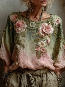 Close-up of 3D floral embroidery and gradient linen fabric on this vintage summer dress