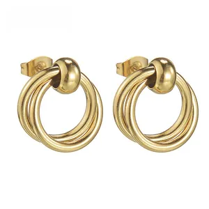 Close-up of polished 14K gold plated stainless steel multi-layered hoop earrings detail