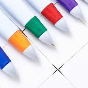 Set of colorful carabiner ballpoint pens with rubber grips and white plastic barrels