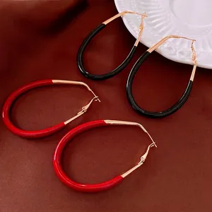 Boucles d'oreilles ovales rétro émaillées rouges et noires sur crochets en métal doré