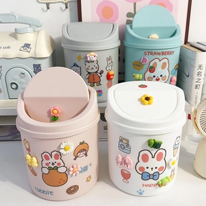Cute mini desktop trash cans in pink, white, grey, and blue with cartoon stickers