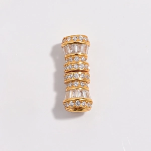 Macro detail of gold S925 silver waist bead with pavé zircon for DIY necklaces