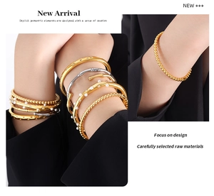 Close-up of gold and silver beaded bamboo bangles with inlaid cubic zirconia for women