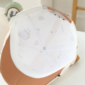 Detail view of the breathable mesh inner lining and reinforced stitching of children's hat