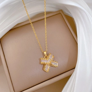Elegant gold titanium steel necklace with butterfly bow pendant and cubic zirconia diamonds