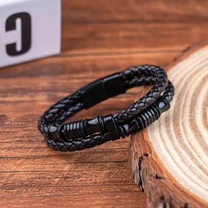 Double-layered black braided leather bracelet for men with black metallic accents