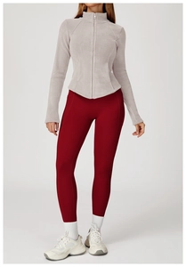 Close-up of light gray fleece jacket featuring a stand collar and flattering slim-fit seams
