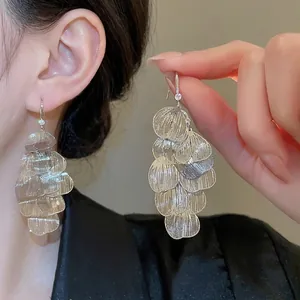 Silver hollow petal fringe drop earrings with multi-layer metallic leaf design