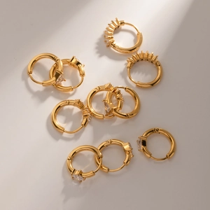 Detailed set of 18k gold plated stainless steel hoop earrings with teardrop zircon crystals