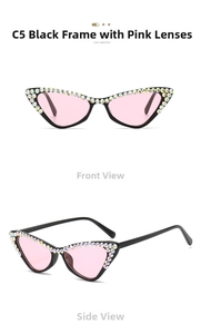 Detail view of cat eye sunglasses with black rhinestone frames and pink lenses