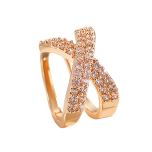 Macro shot of rose gold criss cross ring with sparkling cubic zirconia pave setting