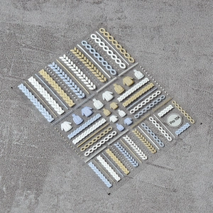 Detailed 3D embossed nail stickers featuring white sweater knit texture patterns