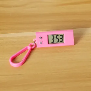 Pink triangular portable digital watch pendant with LCD screen and plastic keychain hook