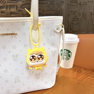 Porte-clés squishy fille aux yeux pop jaune mignon, charme de sac de décompression.