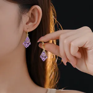 Elegant diamond leaf rhombus drop earrings with purple gradient crystals in gold finish
