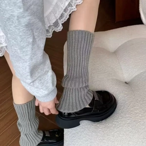 Gray knitted leg warmers for women Y2K style paired with black uniform shoes