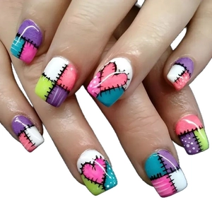 Short press-on nails with colorful patchwork designs, heart patterns and stitch details