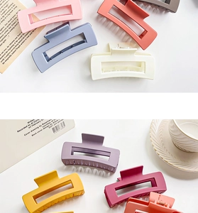 Detail of matte rectangular hair claws in various Macaron colors for hair styling