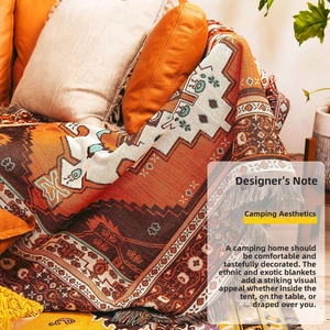 Close-up of bohemian geometric woven blanket with colorful tassels and ethnic texture