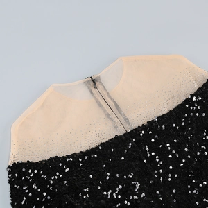 Detail of sequin mesh stitching and invisible zipper on the elegant evening dress