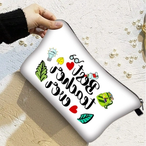Close-up of Best Teacher Ever doodle pattern on white portable travel makeup pouch