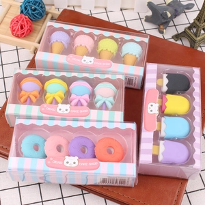 Close-up of creative dessert-shaped erasers in colorful gift box packaging