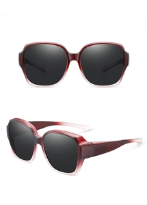 Red polarized fit-over sunglasses with dark grey lenses shown from front and 45-degree angle