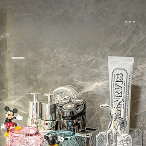 Detail of suction cup toothbrush holder with drainage design and acrylic finish
