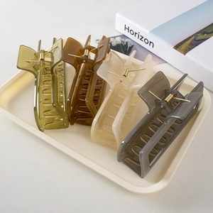Set of four 13cm oversized matte rectangular hair claws in olive green and neutral tones