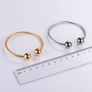 Adjustable punk twisted wire stainless steel bangles in gold and silver finish