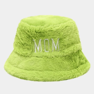 Detail of neon green plush bucket hat with thick white MOM 3D embroidery and soft faux fur