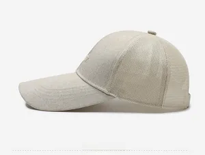 Side view of beige summer outdoor cap with long brim and breathable mesh design