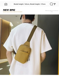 Detail view of mustard yellow nylon crossbody bag with adjustable green strap on model