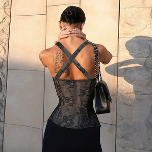 Elegant black lace corset top with cross back straps and slim fit design for women