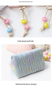Detail of macaron-colored fabric coin purse with colorful stripes and acrylic bead zipper