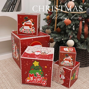 Festive red Christmas gift boxes with snowman and reindeer patterns for holiday packaging