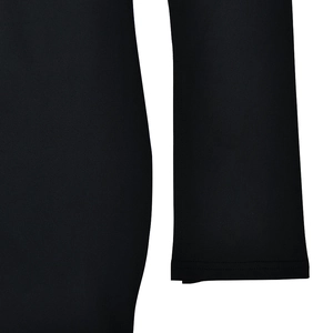 Close-up of the fine fabric texture and neat stitching on a black long-sleeved dress