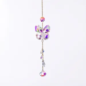 Golden butterfly wind chime with colorful crystal pendants and multifaceted water drops