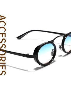 Detail of retro oval punk sunglasses featuring black metal frames and blue gradient lenses